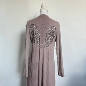 Purple angel winged cardigan.